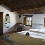 Bedroom 4 – a twin bedded room with wardrobe, chest of drawers and views over the surrounding countryside